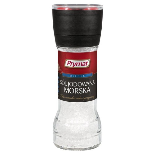 Prymat Sól jodowana morska w szklanym młynku. Białe kryształki soli widoczne przez opakowanie.