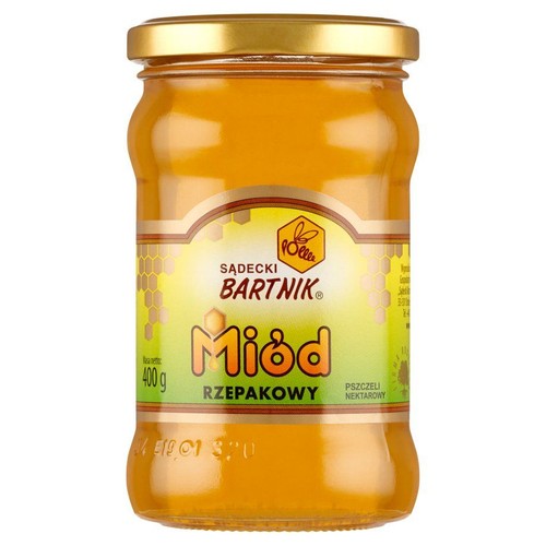 Szklany słoik miodu rzepakowego Sądecki Bartnik o masie netto 400g. Na etykiecie widnieje logo z pszczołą, nazwa marki i informacja "Pszczeli Nektarowy". Słoik jest zamknięty złotą metalową nakrętką.