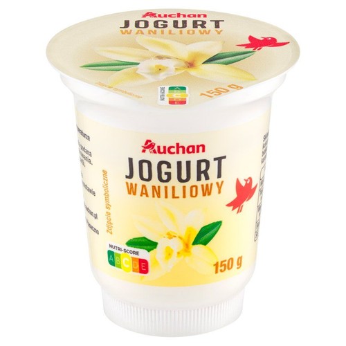 Biały kubek jogurtu waniliowego Auchan, 150 g. Na etykiecie kwiat wanilii.