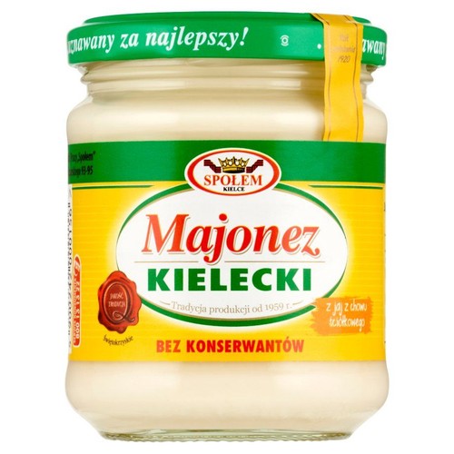 Słoik Majonezu Kieleckiego z żółtą etykietą i zieloną zakrętką. Produkt bez konserwantów, z jaj z chowu ściółkowego.