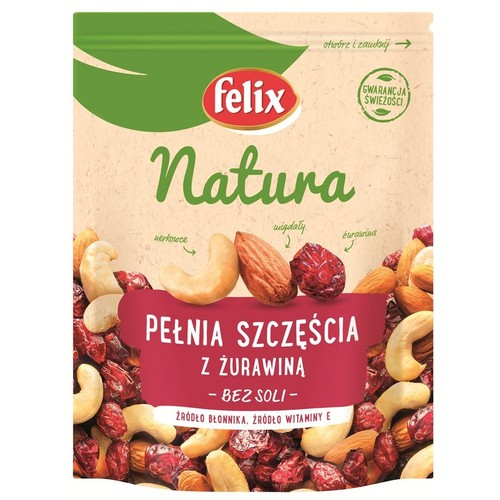 Opakowanie produktu Felix Natura Pełnia Szczęścia z Żurawiną. Na beżowym tle widoczna mieszanka orzechów nerkowca, migdałów i suszonej żurawiny. Produkt bez soli, źródło błonnika i witaminy E. Z gwarancją świeżości.