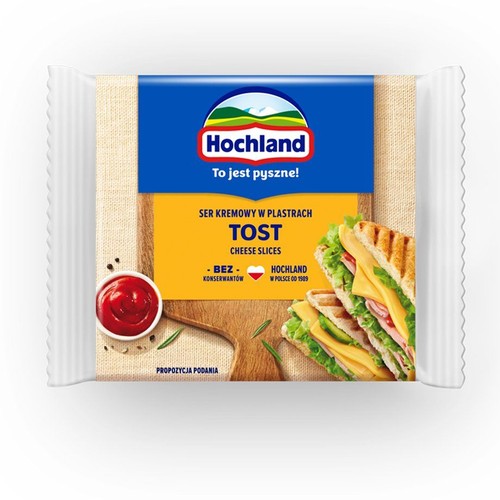 Opakowanie sera kremowego Hochland Tost w plastrach, bez konserwantów. Na grafice tost z serem i ketchup.