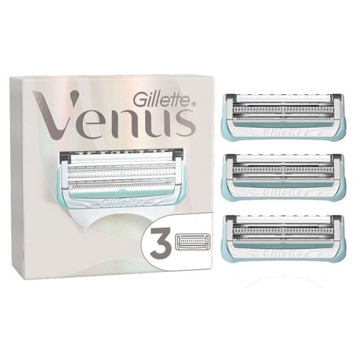 Opakowanie Gillette Venus z 3 wkładami do maszynki. Trzy wkłady leżą obok pudełka.