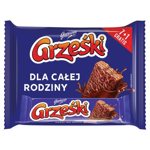 Niebieskie opakowanie zbiorcze wafli Grześki Goplana. Na opakowaniu duży napis "Grześki" i "Dla całej rodziny". W prawym górnym rogu czerwony pasek z napisem "7+1 gratis". Centralnie grafika wafli zanurzonych w czekoladzie.