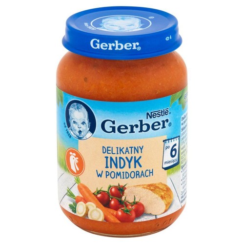 Słoik Gerber z przecierem Delikatny Indyk w Pomidorach. Etykieta z grafiką indyka, pomidorów i marchewki. Dla dzieci po 6 miesiącu.