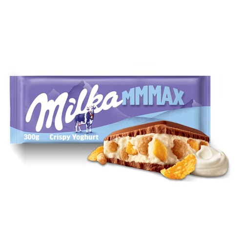 Czekolada Milka MMMax Crispy Yoghurt 300g w fioletowym opakowaniu z logo Milka i krową. Obok grafika przedstawiająca przekrój batonika z czekoladą, kremem jogurtowym i chrupiącymi płatkami.