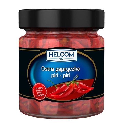 Słoik papryczek piri-piri Helcom. Na etykiecie napis "Ostra papryczka piri - piri" i grafika papryczek.