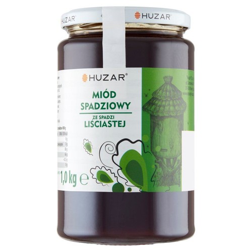 Miód spadziowy liściasty Huzar w szklanym słoiku, 1 kg. Biała etykieta z zielonymi elementami i grafiką ula.