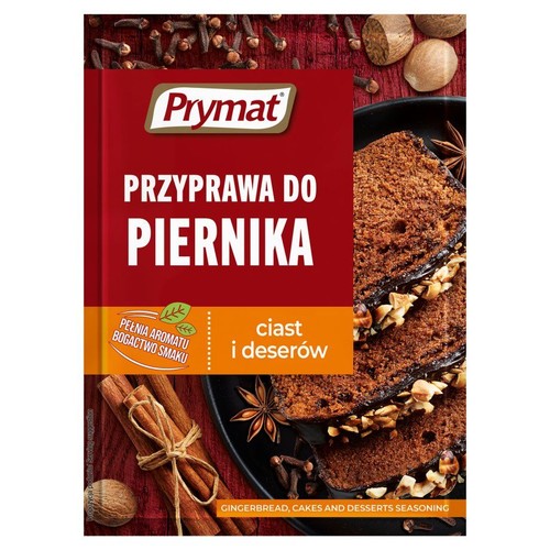 Prymat Przyprawa do Piernika w czerwonym opakowaniu, z obrazem piernika i korzennych przypraw.