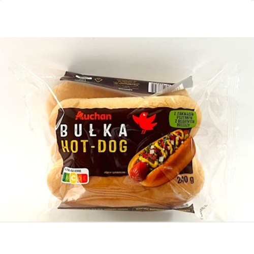 Cztery bułki do hot-dogów marki Auchan, 240 g, zapakowane w przezroczystą folię. Na etykiecie widnieje nazwa produktu "BUŁKA HOT-DOG" oraz apetyczna grafika gotowego hot-doga z sosem i dodatkami.