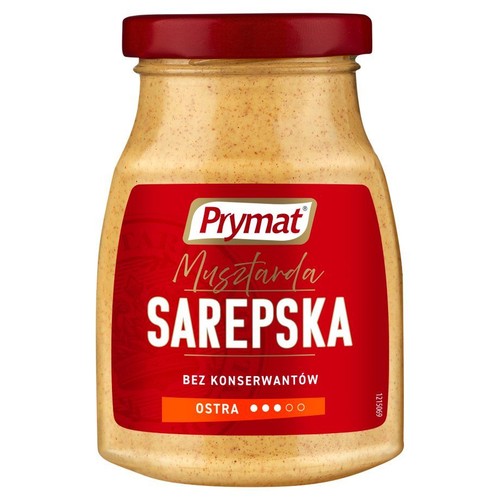 Musztarda Sarepska Prymat w szklanym słoiku z czerwoną zakrętką. Etykieta informuje, że jest ostra i bez konserwantów.