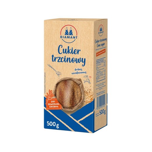 Cukier trzcinowy Diamant Dry Demerara Drobna, 500g. Kartonowe opakowanie z grafiką cukru i łyżeczki.