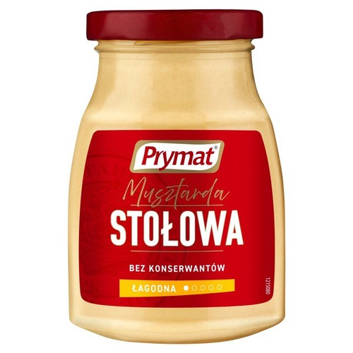 Musztarda stołowa Prymat w szklanym słoiku z czerwoną zakrętką. Etykieta informuje o braku konserwantów.