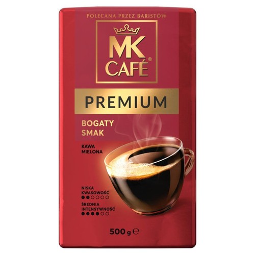 Czerwone opakowanie kawy mielonej MK Cafe Premium, 500g. Na opakowaniu filiżanka kawy. Niska kwasowość, średnia intensywność.