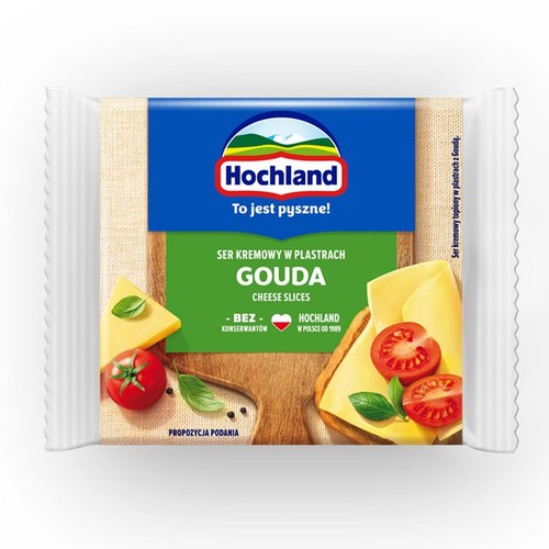 Opakowanie sera Hochland Gouda w plastrach, bez konserwantów. Na etykiecie grafika z serem, pomidorami i bazylią.