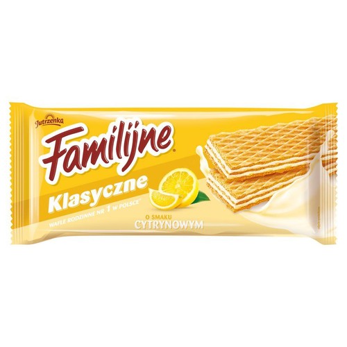 Żółte opakowanie wafli Jutrzenka Familijne Klasyczne o smaku cytrynowym. Na opakowaniu grafika wafli i cytryny.