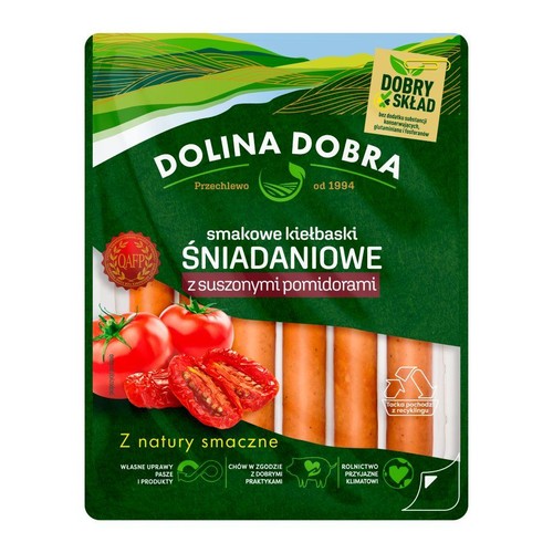 Opakowanie kiełbasek śniadaniowych Dolina Dobra z suszonymi pomidorami. Widoczne kiełbaski, świeże i suszone pomidory.