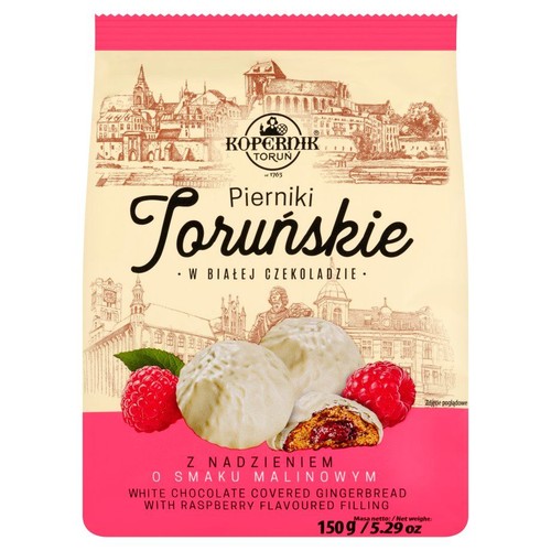 Opakowanie pierników Kopernik Toruńskich w białej czekoladzie z nadzieniem malinowym, 150g. Na opakowaniu ilustracja miasta i pierniki.