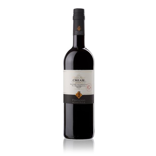 Ciemna butelka sherry Fernando de Castilla Cream. Na białej etykiecie widnieje nazwa "CREAM SHERRY" oraz informacja o pochodzeniu: "Jerez de la Frontera - Hiszpania od 1977". Poniżej złoty herb.