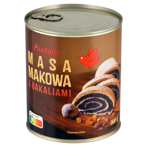 Produkt Auchan: Masa Makowa z Bakaliami w metalowej puszce o pojemności 900g. Etykieta w odcieniach brązu z czerwonym logo ptaka. Grafika prezentuje kawałki makowca, rodzynki i główkę maku, sugerując sposób podania.