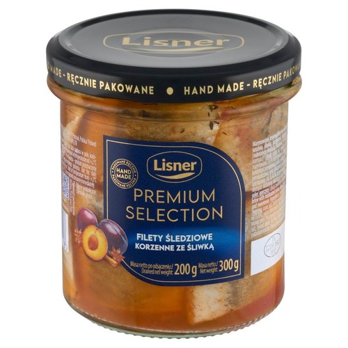 Lisner Premium Selection, filety śledziowe korzenne ze śliwką w słoiku. Czarna zakrętka z napisem "Hand Made - Ręcznie pakowane". Na etykiecie grafika śliwek i anyżu. Masa netto 300g.