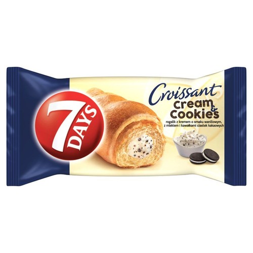 Rogalik 7 Days z kremem o smaku waniliowym, mlekiem i kawałkami ciastek kakaowych. Na niebiesko-kremowym opakowaniu.