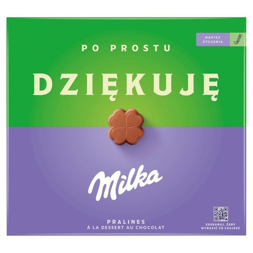 Opakowanie czekoladowych pralin Milka z napisem "Po prostu Dziękuję". Pudełko jest fioletowo-zielone, z grafiką czekoladowej koniczynki. Na opakowaniu informacja o pralinach do deseru czekoladowego.