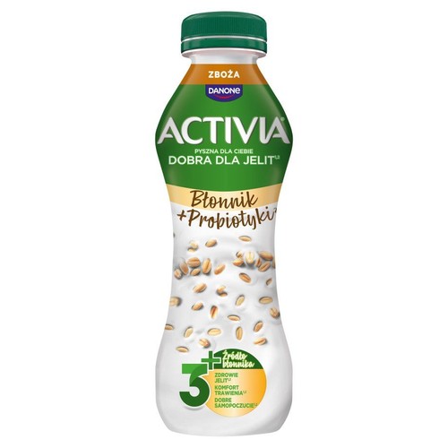 Butelka Activia Zboża Błonnik + Probiotyki. Zielona nakrętka, zielono-beżowa etykieta z grafiką ziaren zbóż.