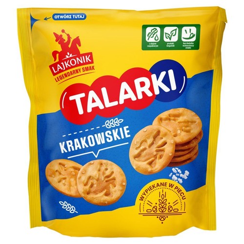 Żółte opakowanie krakersów Lajkonik Talarki Krakowskie. Na opakowaniu widoczne są złociste, okrągłe krakersy z solą. Produkt jest wegański, wypiekany w piecu, z olejem rzepakowym i bez dodatku wzmacniaczy smaku.