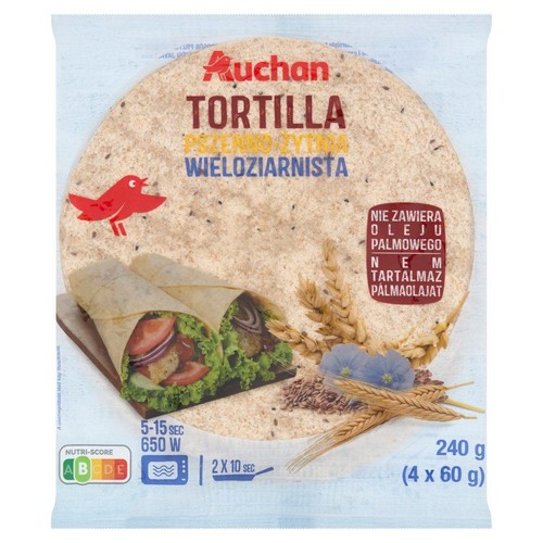 Produkt Auchan: Tortilla Pszenno-Żytnia Wieloziarenista. Opakowanie 240g, zawierające 4 placki. Na grafice gotowe tortille z nadzieniem, kłosy pszenicy i nasiona lnu. Produkt nie zawiera oleju palmowego.