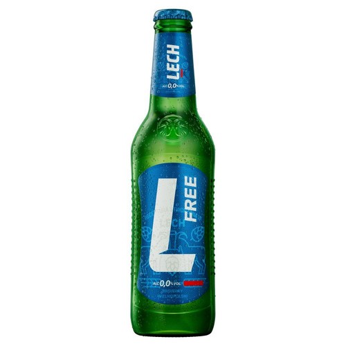 Butelka piwa bezalkoholowego Lech Free 0,0% w zielonym szkle, z niebieską etykietą i zakrętką. Na etykiecie widnieje nazwa LECH u góry, duża biała litera L oraz pionowy napis FREE. Cała butelka jest pokryta drobnymi kroplami wody.