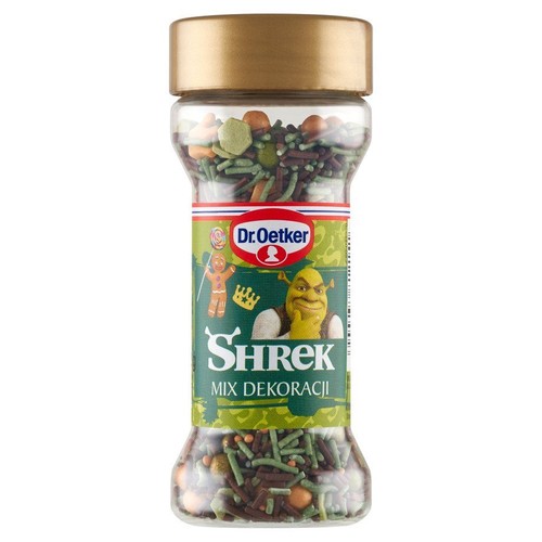 Dr. Oetker Shrek Mieszanka Dekoracyjna w przezroczystym słoiku z złotą nakrętką. Zawiera kolorowe posypki.