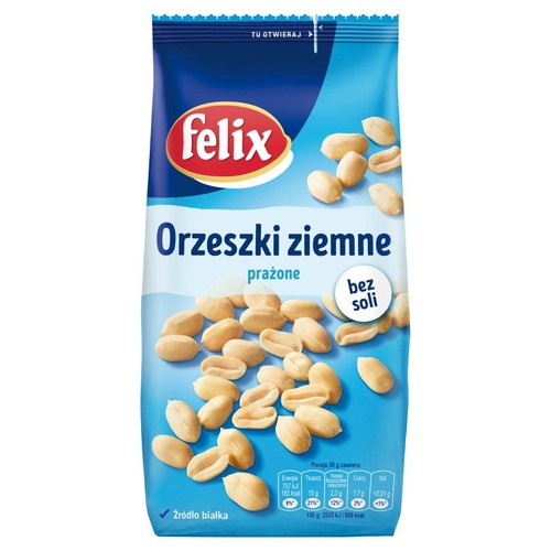 Opakowanie orzeszków ziemnych Felix, prażonych i bez soli, w kolorze niebieskim z białymi elementami. Na froncie opakowania znajduje się grafika przedstawiająca wiele łuskanych orzeszków ziemnych.