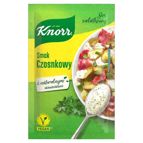 Knorr Sos sałatkowy Smak Czosnkowy, z naturalnymi składnikami. Opakowanie z grafiką sałatki i łyżki z sosem. Wegański.
