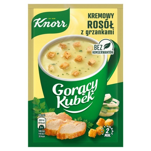 Saszetka Knorr Gorący Kubek Kremowy Rosół z grzankami. Na opakowaniu widoczna grafika przedstawiająca zielony kubek z zupą, posypaną grzankami i natką pietruszki. Obok plastry gotowanego mięsa. Produkt bez konserwantów.
