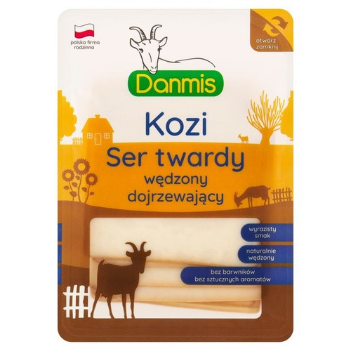 Opakowanie sera koziego twardego wędzonego dojrzewającego Danmis. Widoczny kawałek sera. Grafika kozy i wiejskiego krajobrazu.