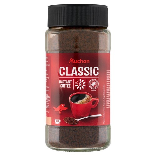 Kawa rozpuszczalna Auchan Classic w szklanym słoiku z czarną zakrętką. Na etykiecie filiżanka kawy.