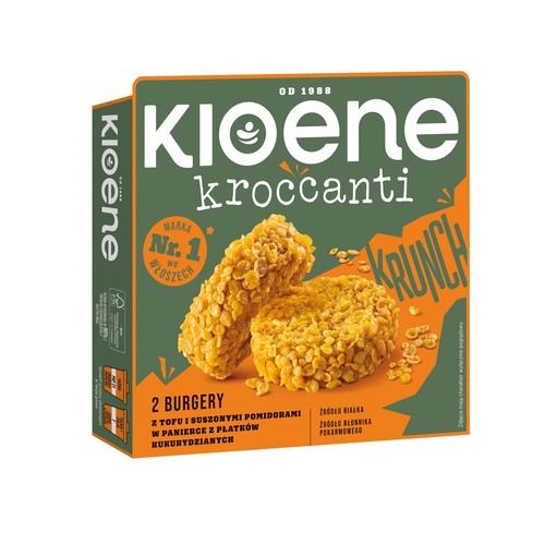 Kioene Kroccanti, opakowanie z dwoma burgerami z tofu i suszonymi pomidorami w panierce z płatków kukurydzianych. Burgery mają złocisty kolor i chrupiącą teksturę. Produkt jest źródłem białka i błonnika pokarmowego.