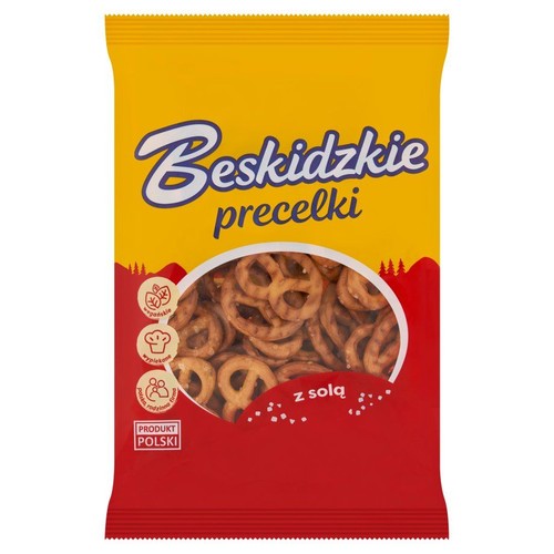 Opakowanie precelków Beskidzkie z solą. Żółta góra, czerwony dół. Przezroczyste okienko pokazuje słone precelki.