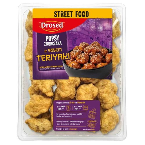 Drosed Popsy z kurczaka Teriyaki w przezroczystym opakowaniu. Widoczne panierowane kawałki kurczaka i etykieta z grafiką gotowego dania.