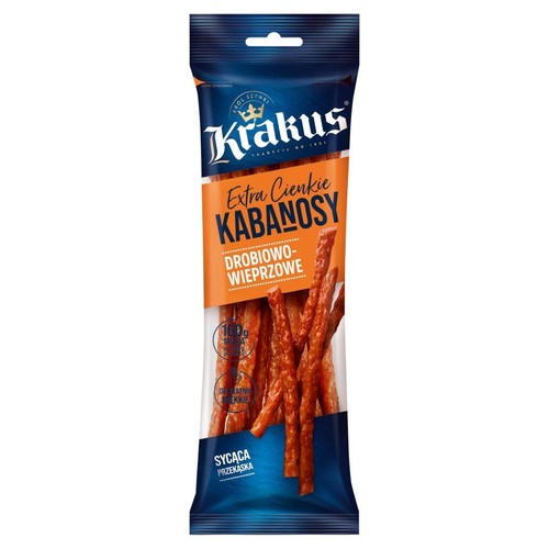 Opakowanie kabanosów Krakus Extra Cienkie Drobiowo-Wieprzowe, 160g. Niebiesko-pomarańczowa paczka z widocznymi kabanosami.