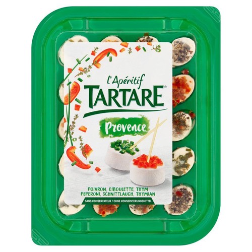 Opakowanie serków Tartare L'Apéritif Provence. Zawiera 12 małych porcji serków z różnymi ziołowymi dodatkami.