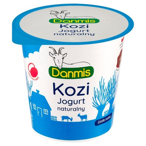 Opakowanie jogurtu koziego naturalnego Danmis. Biały kubek z niebieską pokrywką i grafiką kozy oraz wiejskiego krajobrazu.