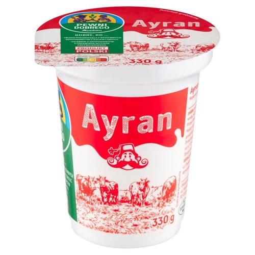 Biały kubek Ayranu 330g marki Auchan. Na etykiecie logo "Pewni Dobrego" i rysunki krów.