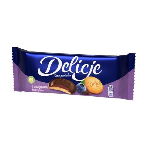 Opakowanie Delicji Szampańskich o smaku jagodowym. Na fioletowo-niebieskim tle grafika ciastek z galaretką i borówek.