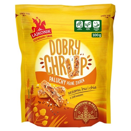 Żółte opakowanie Lajkonik Dobry Chrup Paluchy Pełne Ziaren, 100 g. Paluszki z sezamem, lnem i chia z zakwasem, wypiekane w piecu. Z olejem rzepakowym, źródło błonnika, bez wzmacniaczy smaku.