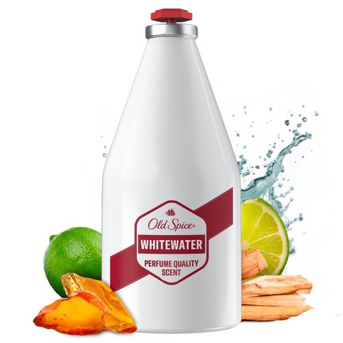 Biała butelka Old Spice Whitewater z czerwoną nakrętką i etykietą. Obok limonki, bursztyn, drewno i woda.