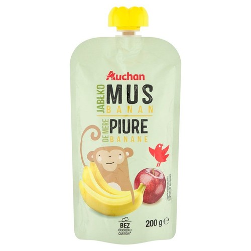 Saszetka musu owocowego Auchan o smaku jabłkowo-bananowym, waga 200g. Opakowanie w jasnym kolorze z żółtą zakrętką. Na froncie grafika uśmiechniętej małpki, kiści bananów, czerwonego jabłka i małego ptaszka. Produkt bez dodatku cukrów.