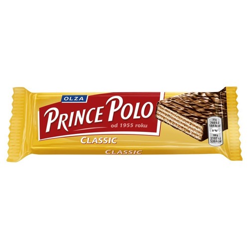 Wafel Prince Polo Classic w żółto-czerwonym opakowaniu. Widoczna grafika wafelka z warstwami i czekoladową polewą. Na opakowaniu logo Olza i informacja "od 1955 roku".