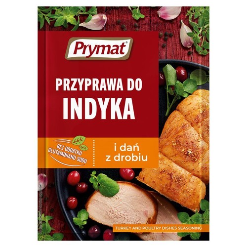 Przyprawa Prymat do indyka i drobiu w czerwonym opakowaniu. Widoczna grafika gotowego dania z pieczonym mięsem drobiowym, żurawiną, czosnkiem i zielonymi ziołami. Etykieta informuje o braku glutaminianu sodu.